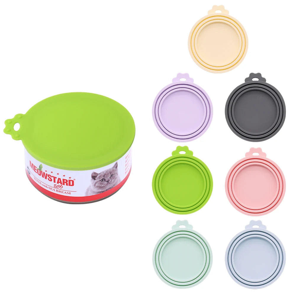 Set of colorful silicone lids on a white background with a cat food can.